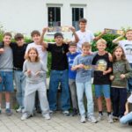 Gruppenbild mit Teams und Kickerpaten